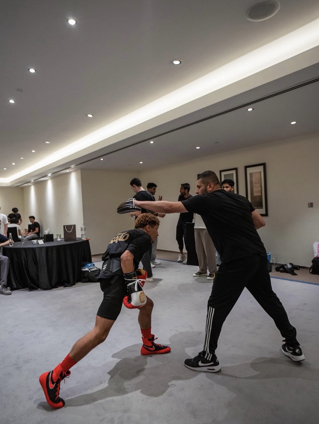 Saad Abdullah training in a dark boxing gym